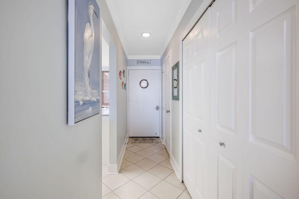 Bright, airy hallway leading to your cozy retreat