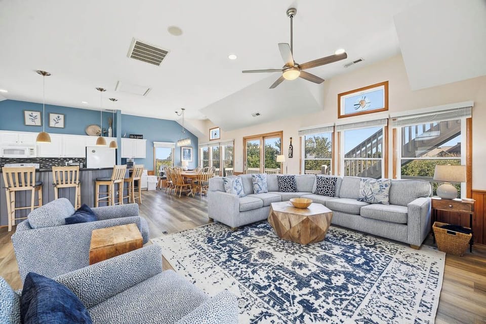 Top-Level Living Room with Deck Access