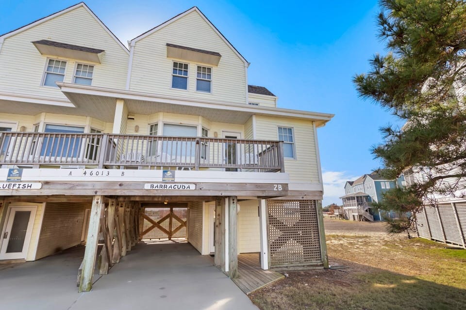 Welcome to Barracuda—a freshly renovated Buxton townhome just steps from the sand.