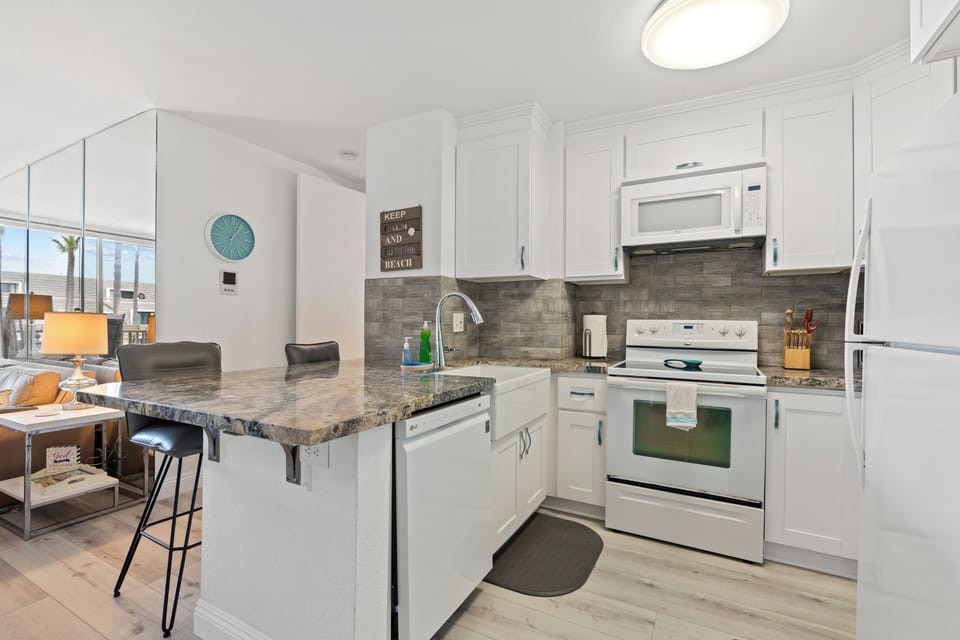 Modern coastal kitchen with granite countertops