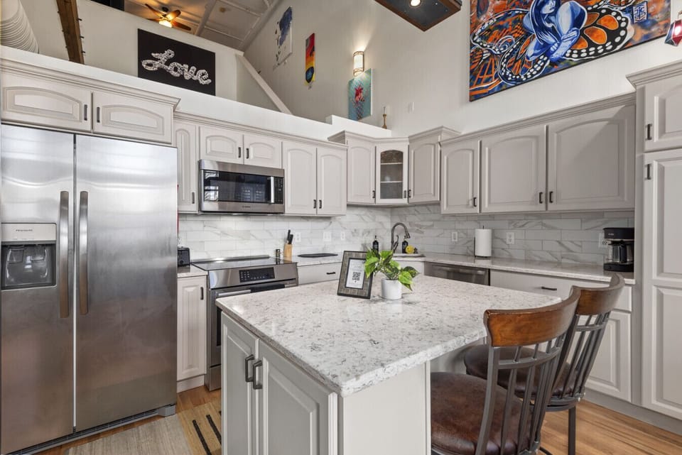 Art featured in the open-concept kitchen