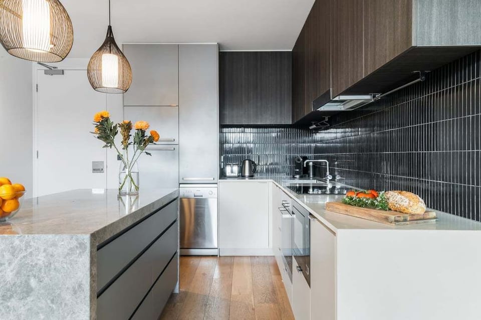 KITCHEN: Modern kitchen with all the needed appliances and a pantry with basic supplies.