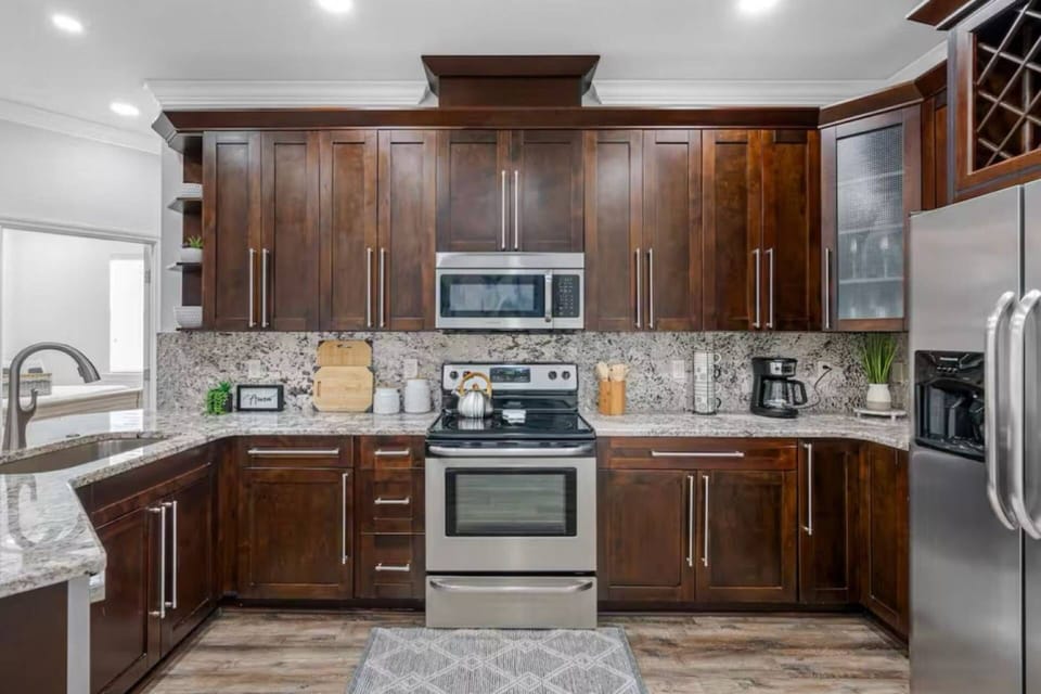 Cook, snack, sip—kitchen fully stocked - kitchen in the main house