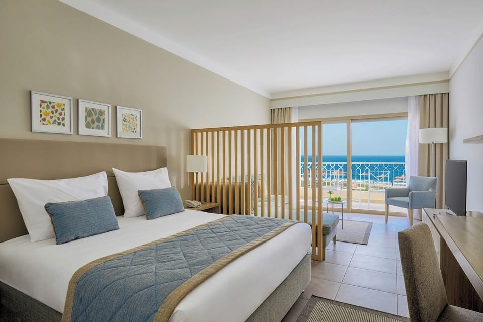 Breathe in ocean views from bed and private balcony seating.
