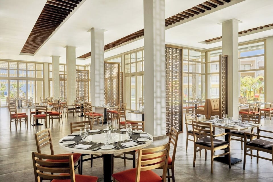 Gather for relaxed dining in a bright, elegant restaurant.