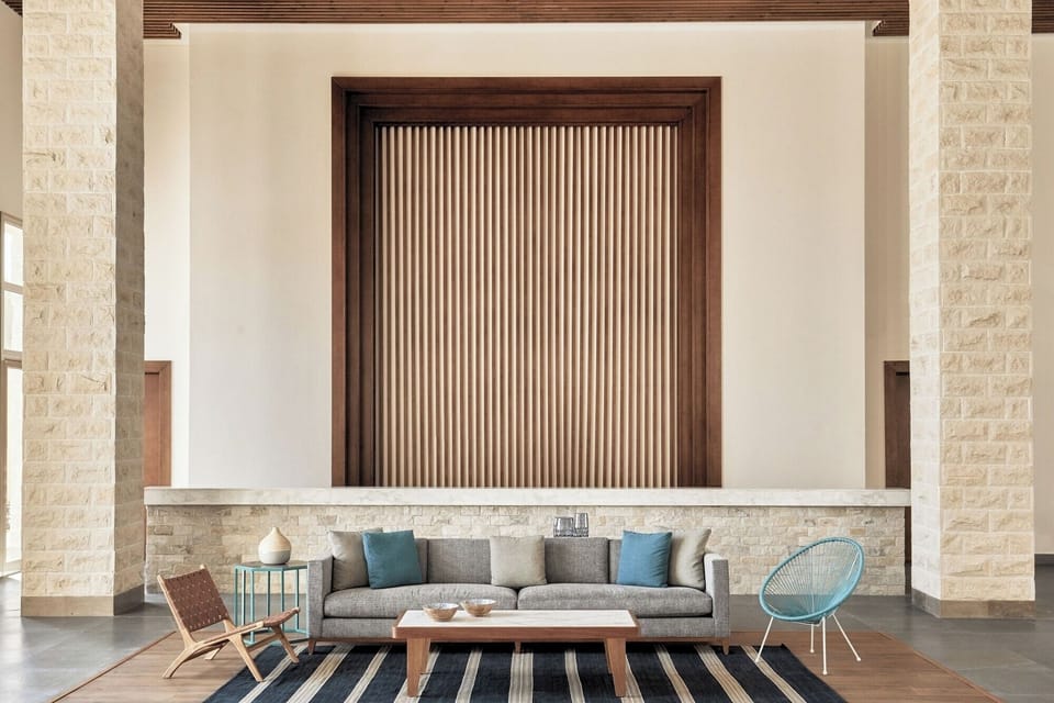 Unwind on plush seating in a calm, airy lounge.