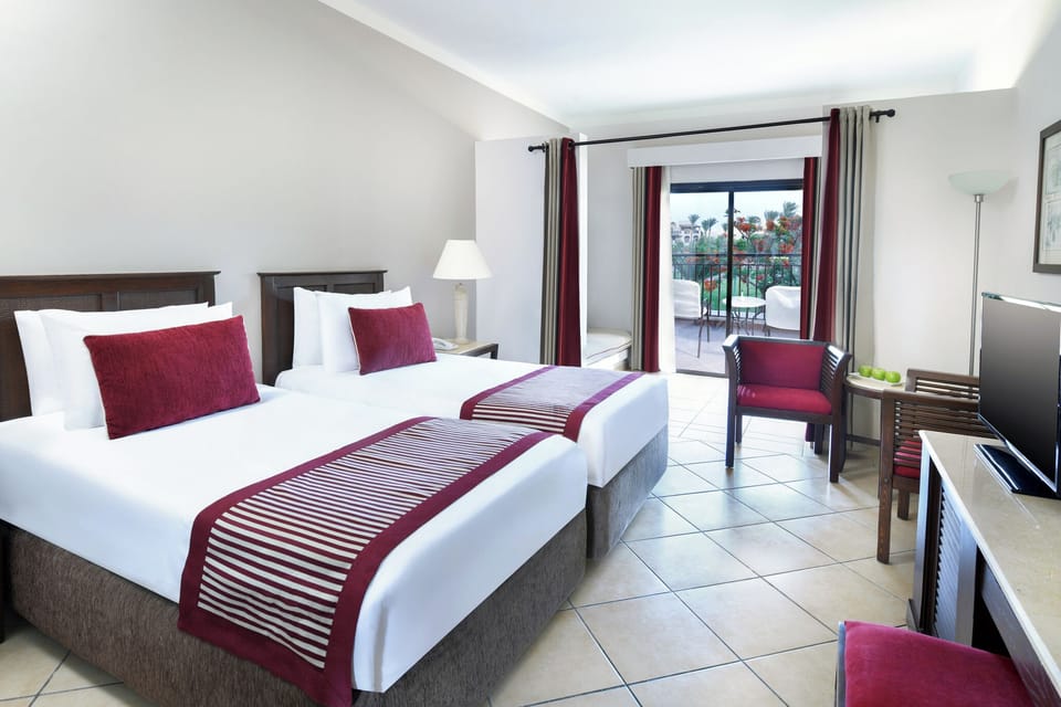 Settle into twin beds after a day by the sea.