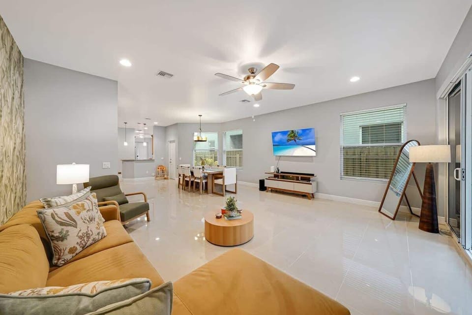 Relax, unwind, and enjoy — this inviting living room with a sleek TV setup is the perfect space to gather with loved ones, binge your favorite shows, or simply cozy up after a long day.