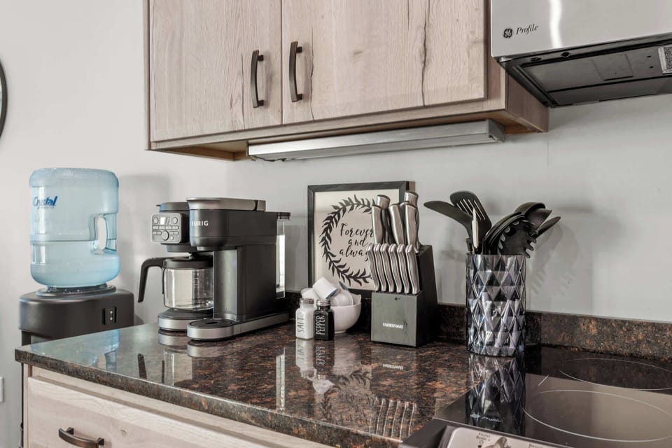 Kitchen: Cook in style — a sleek, fully equipped kitchen designed for both gourmet meals and casual mornings.