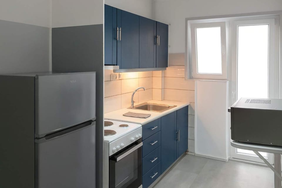 Fully equipped kitchen — cook your favorite meals with ease and comfort.