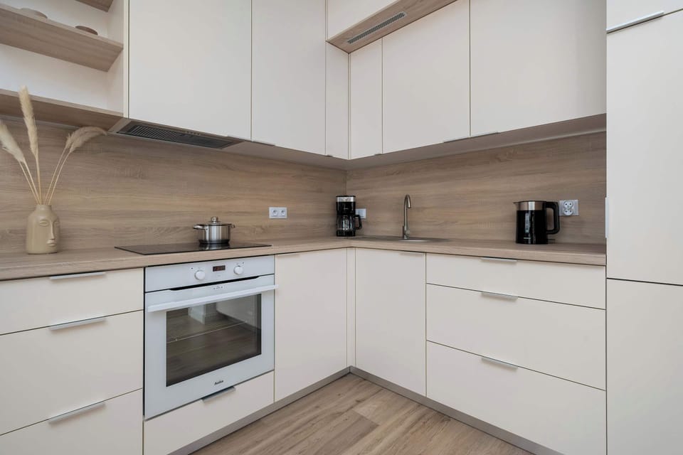 The fully equipped kitchenette includes everything you need for a home-cooked meal.