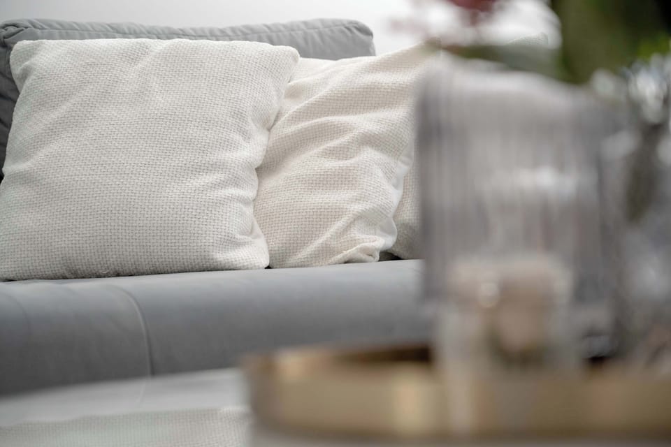 Enjoy your favorite shows on the flat-screen television in the elegant living area.