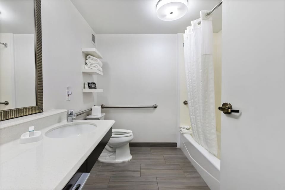 Refresh with a hot shower and bright, spotless bath space.