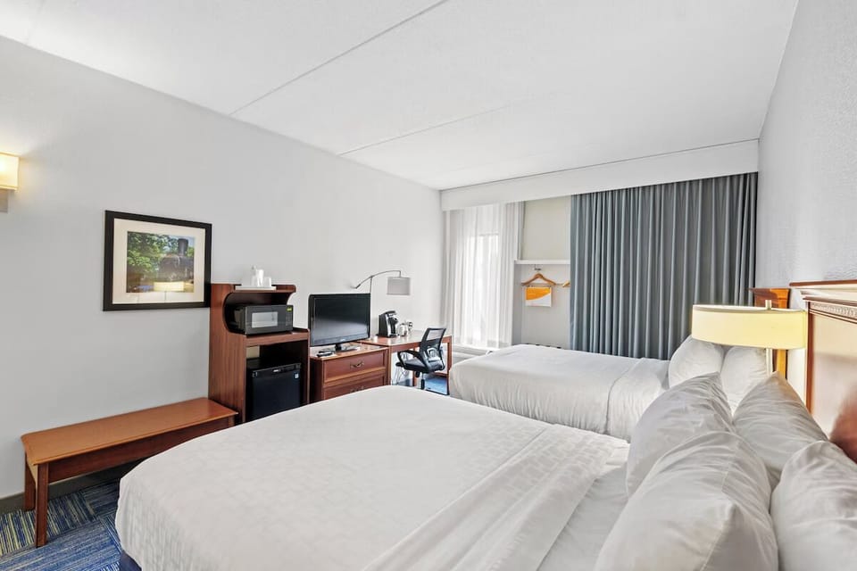 Stretch out with extra space, desk comfort, and soft lighting.
