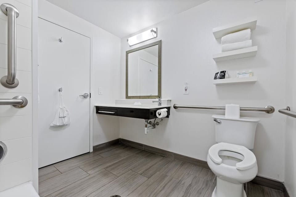 Get ready with a wide vanity and easy-access bathroom layout.
