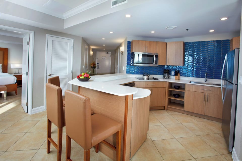 Cook effortlessly in the sleek kitchen with spacious breakfast bar.