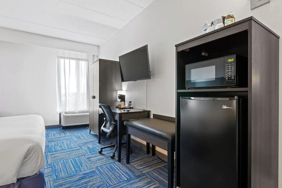 Recharge with handy in-room fridge, microwave, and dedicated desk.