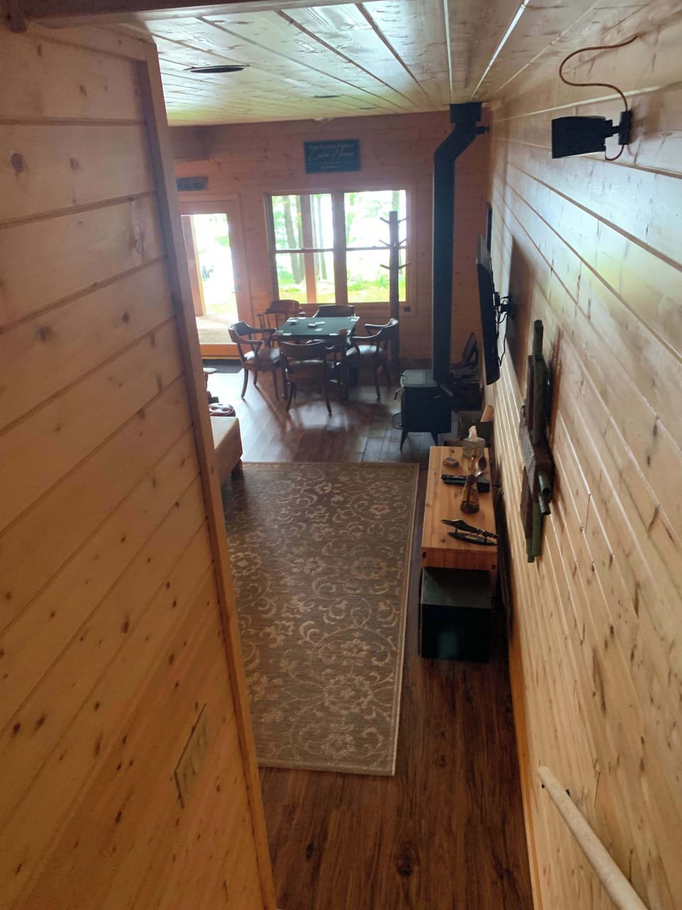 Finished walk-out lower level.  2 bedrooms with queen beds + 1 full shared bathroom on this level.  (Accurate Illustration, AI Enhanced Decor Due to Build In Progress)  