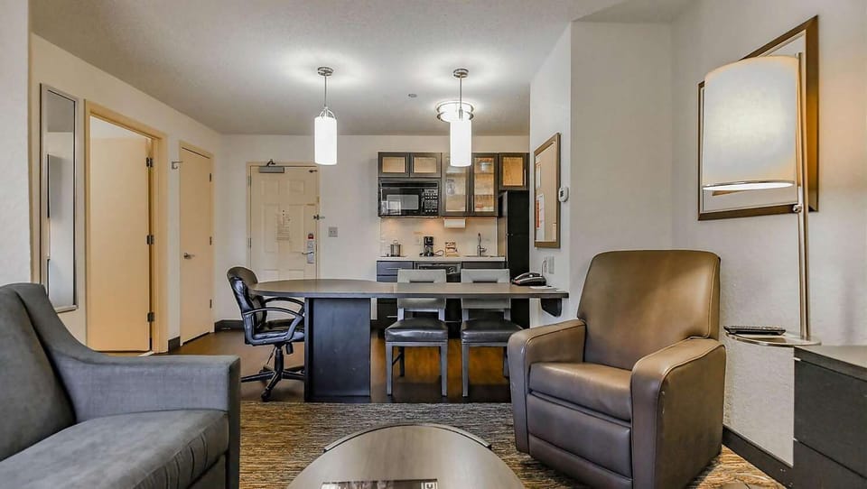 Gather for meals and movie nights in this open suite.