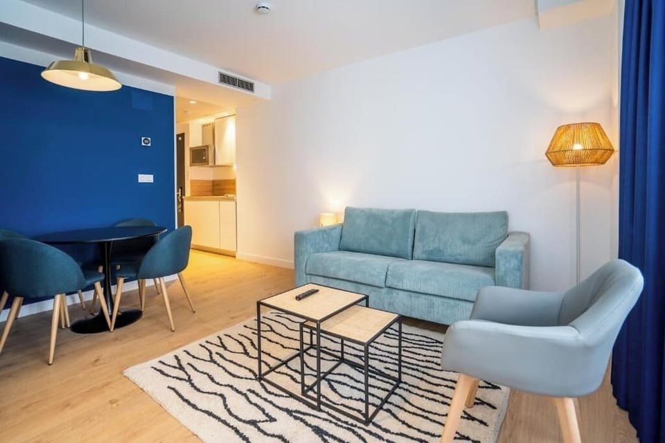 Gather for meals and movie nights in this open-plan space.