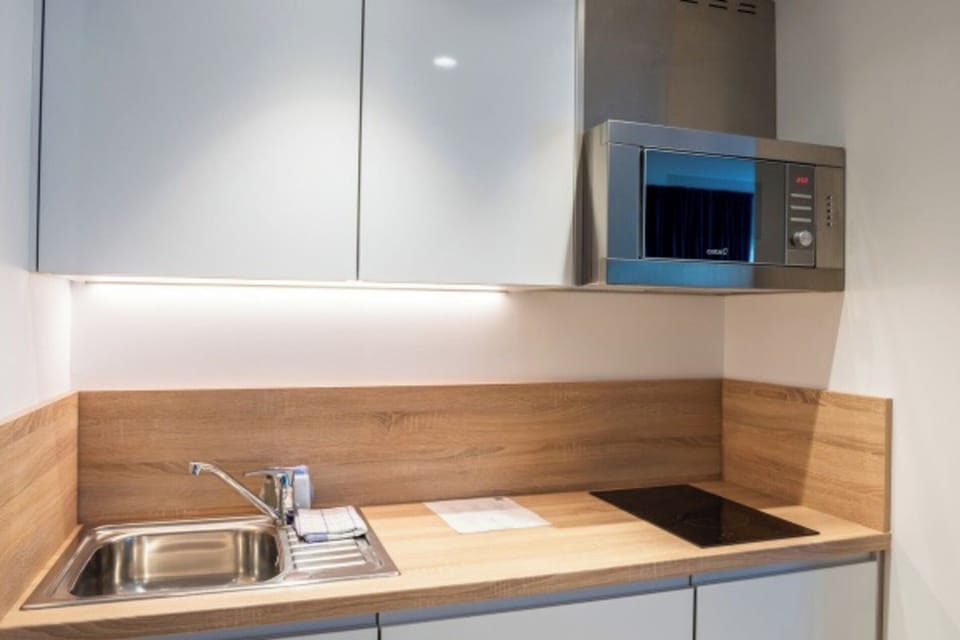 Prep quick bites with an efficient counter and built-in microwave