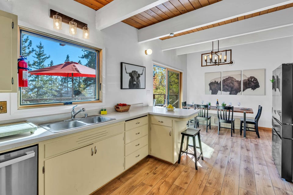 Kitchen: Smaller in size yet fully equip to cook a family meal. Authentic wood-beamed ceilings and vintage cabinetry equipped with a drip coffee maker, toaster, blender, and essential cooking utensils.
