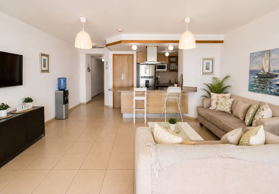 Living Area: Bright and airy space with stylish decor, perfect for relaxing or Netflix binge-watching!