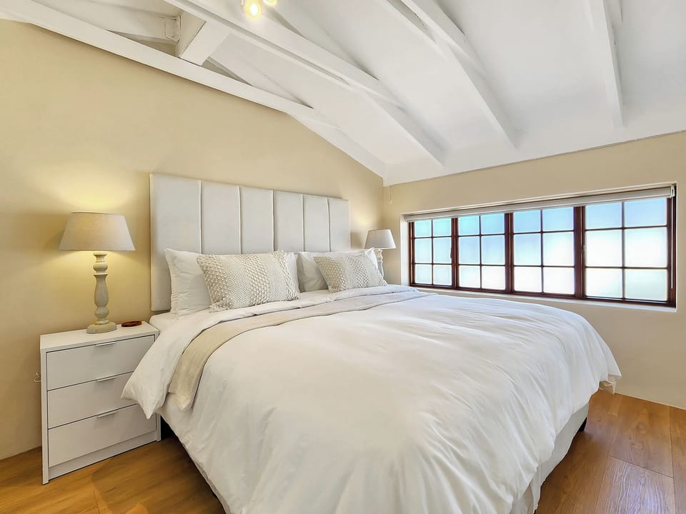 Warm tones and spacious comfort in bedroom 5 (in the Barn)