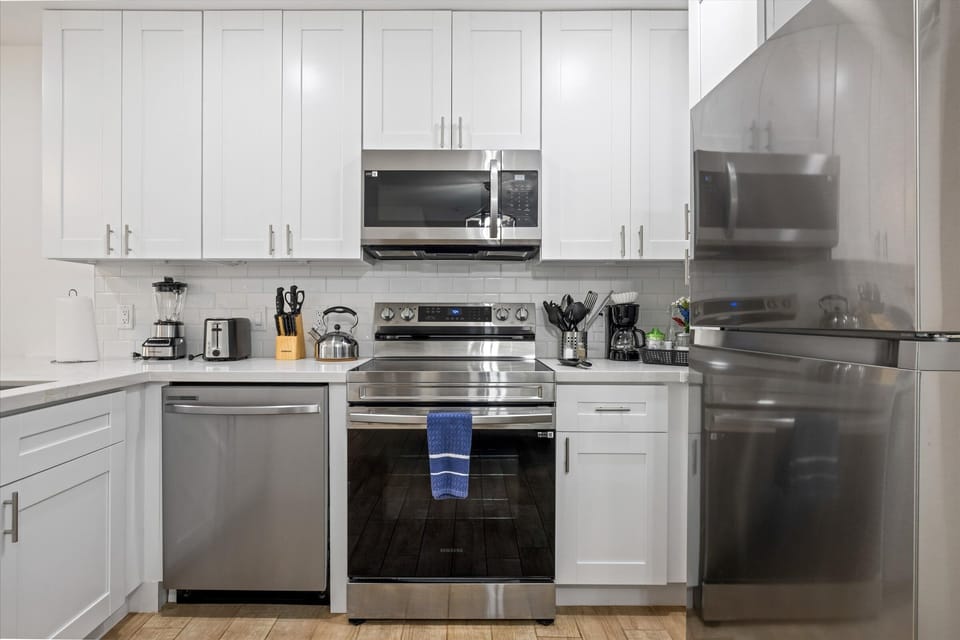 Stainless steel appliances. Coffee bar with drip coffee machine and complimentary coffee, tea, sugar and cream included!