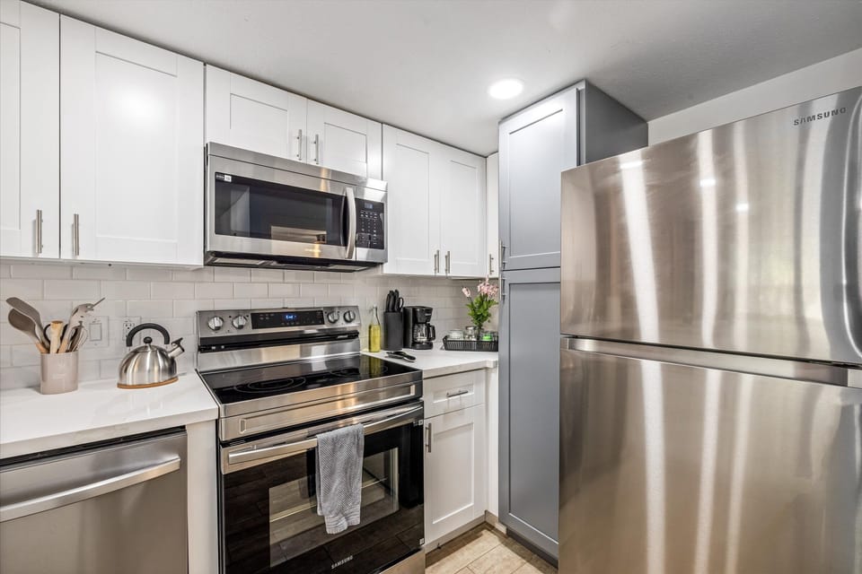 Stainless steel appliances. Coffee bar with drip coffee machine and complimentary coffee, tea, sugar and cream included!