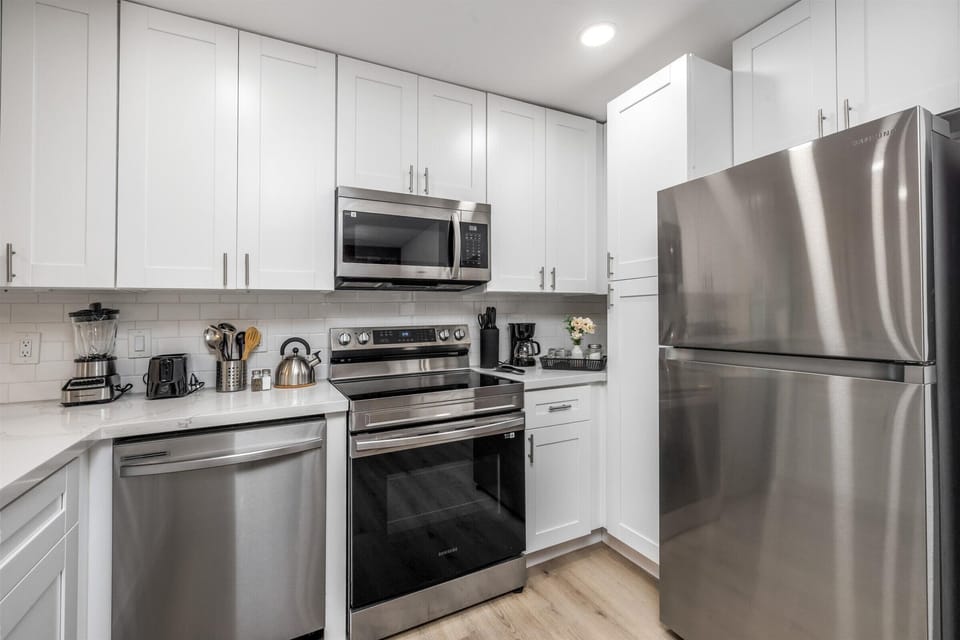 Stainless steel appliances. Coffee bar with drip coffee machine and complimentary coffee, tea, sugar and cream included!