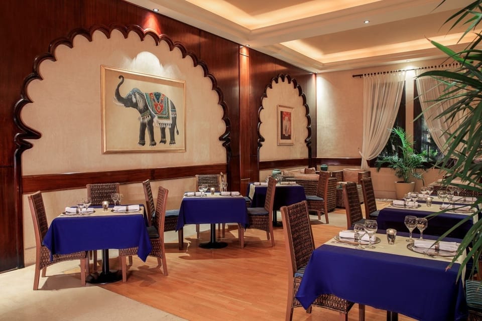 Enjoy intimate dining beneath soft lighting and elegant decor.