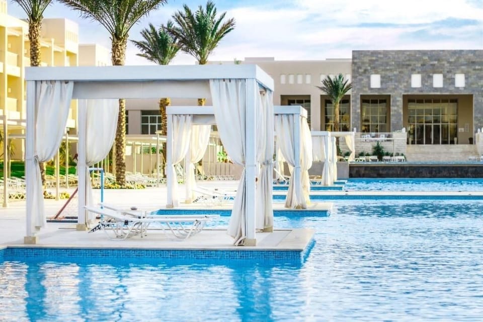 Claim a chic cabana and drift into total relaxation.