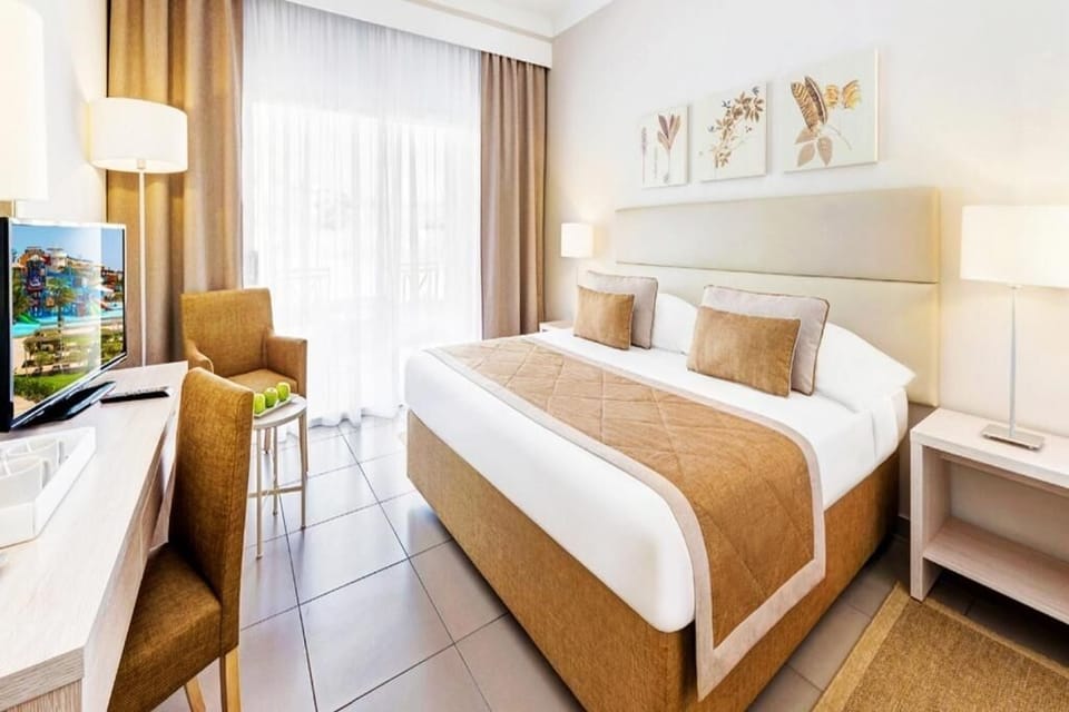 Relax in a calm, neutral bedroom designed for deep sleep.