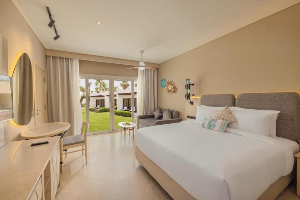 Wake refreshed to garden views through sunlit patio doors.