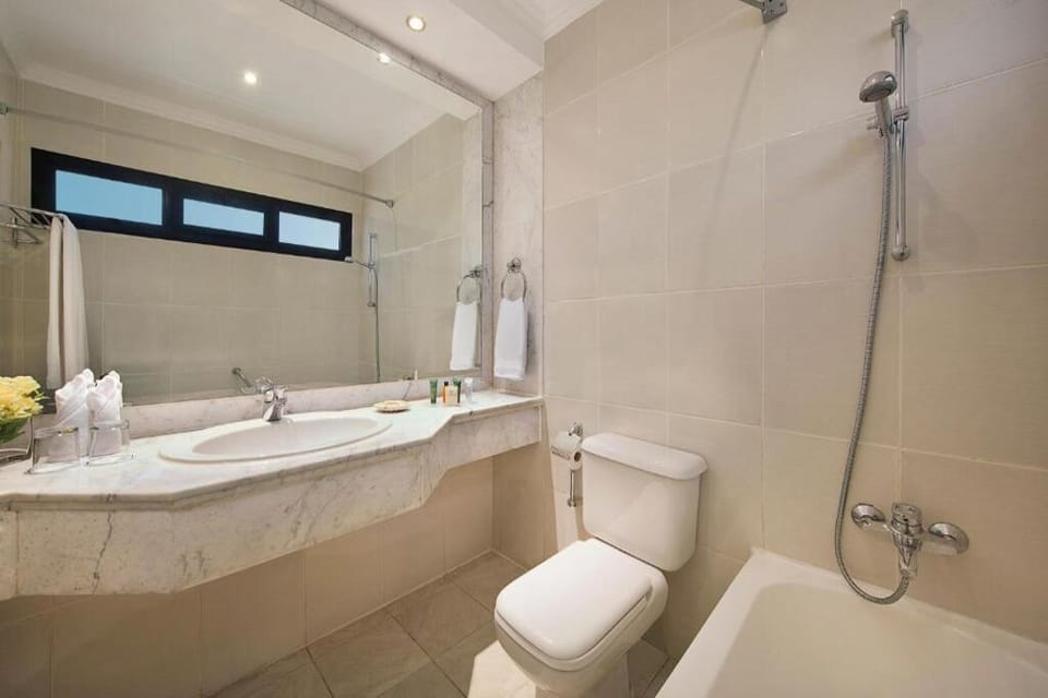Refresh in a spotless, spa-like bath with rain shower.