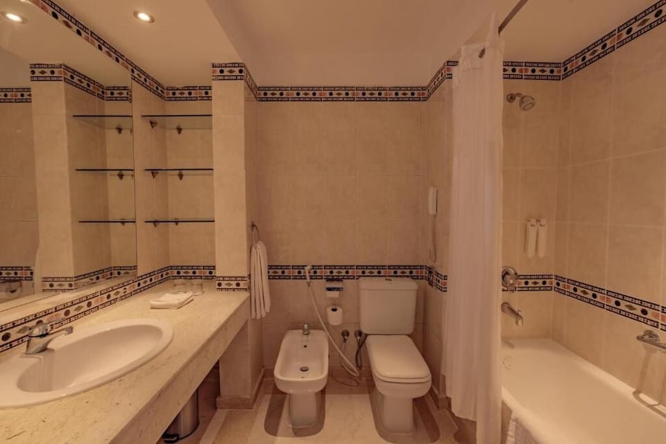 Soak and reset with a deep tub and warm lighting.
