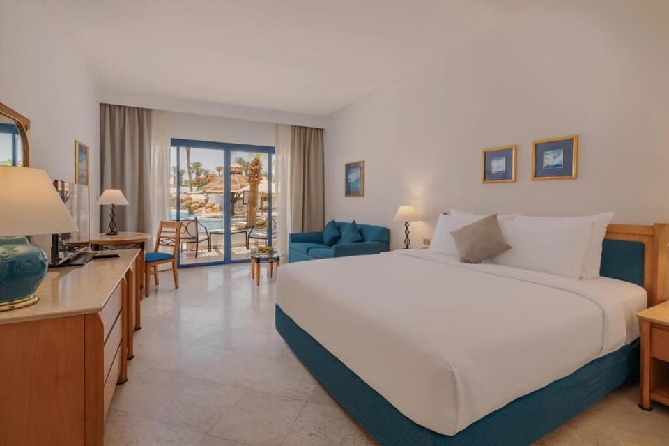 Wake up refreshed in a sunlit king room with terrace.