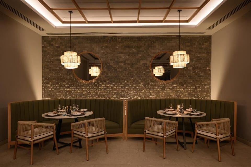 Enjoy a quiet dinner tucked into an inviting, private nook.