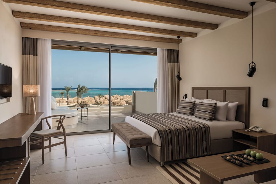 Wake up to sweeping sea views from your plush bed.