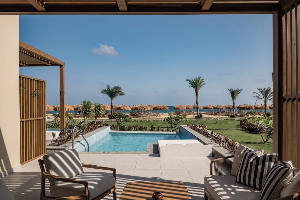 Soak in your plunge pool with beachfront vistas ahead.