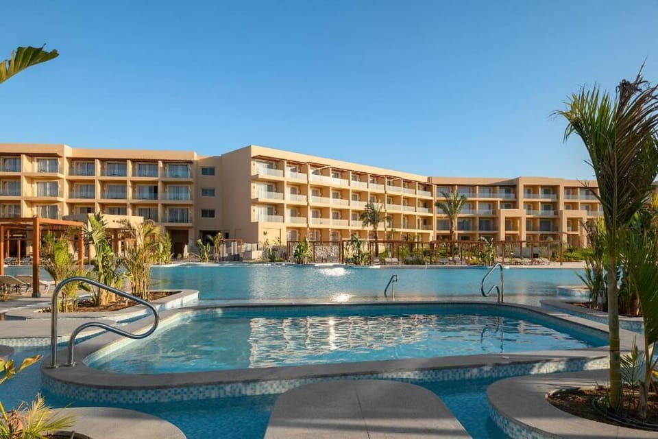 Refresh with a morning swim in the sunlit resort pool.