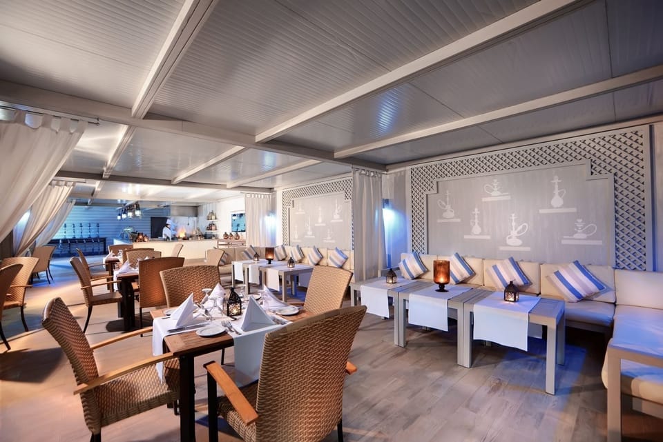 Settle into cushioned banquettes for laid-back evening conversations.