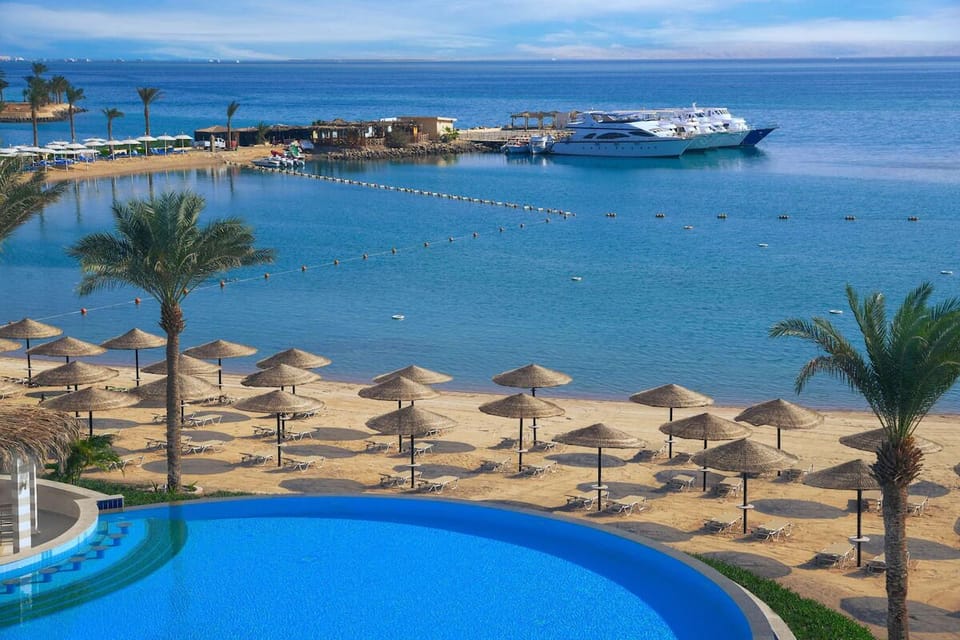 Soak up the sun beside calm waters and sandy shores.