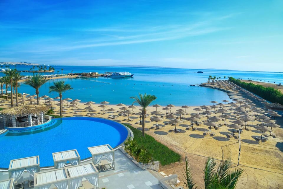 Dive into infinity-blue waters with sweeping sea views.