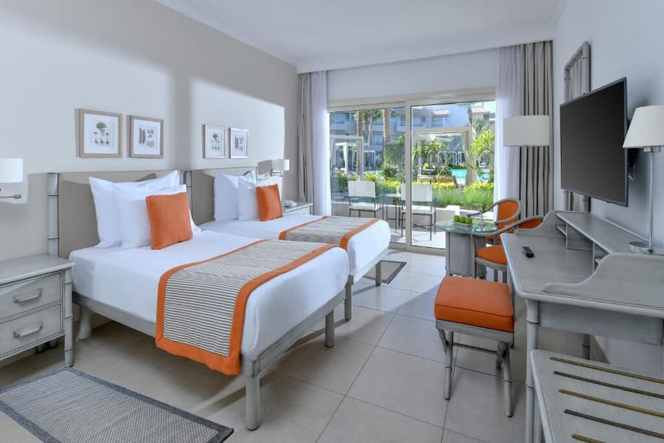 Unwind in crisp twin beds after sun-soaked adventures.