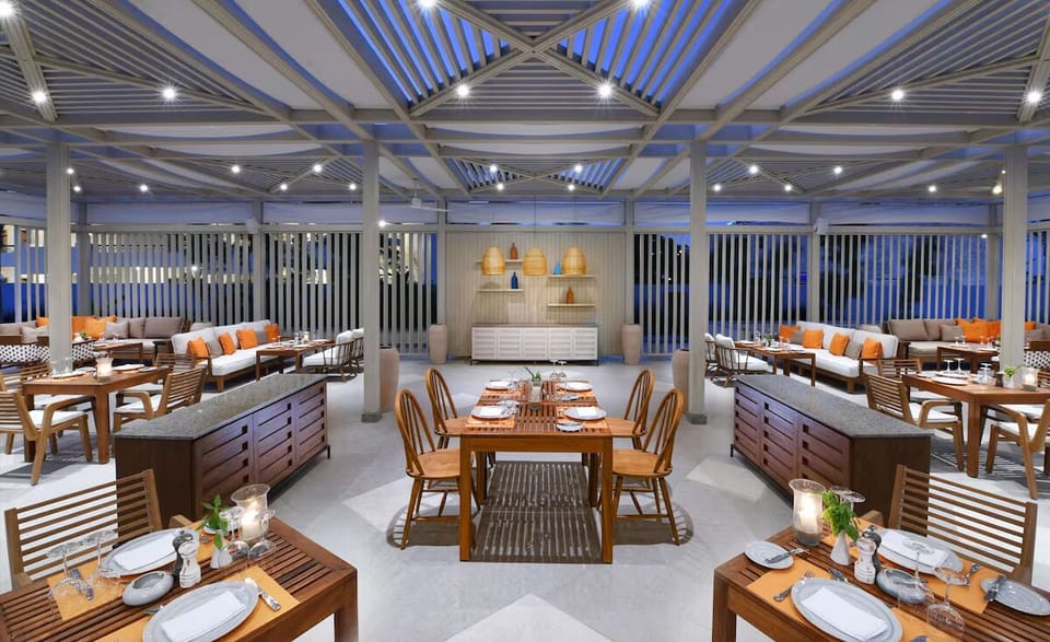 Savor open-air dinners under glowing lights and ocean breezes.