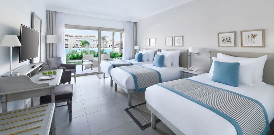 Wake up to garden serenity steps from your private terrace.