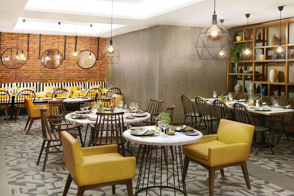 Settle into plush banquettes for an intimate, relaxed dinner.
