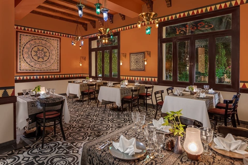 Savor candlelit dinners surrounded by rich patterns and warm colors.